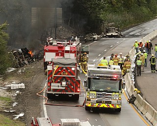        ROBERT K. YOSAY  | THE VINDICATOR..I 80 at the Belmont Ave 82/11 split eastbound lanes were closed for most of Thursday as a tanker truck flipped and caught fire .. and also burned two other vehicles.. no major injuries. . . - -30-...