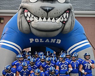 POLAND, OHIO - SEPTEMBER 30, 2016: The Poland Bulldogs wait in the tunnel before running onto the field before the start of their game against the Struthers Wildcats Friday night at Poland High School. DAVID DERMER | THE VINDICATOR