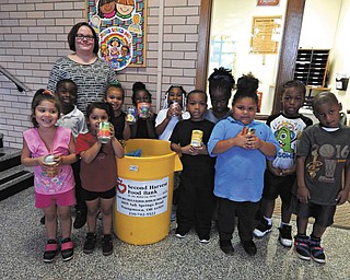 SPECIAL TO THE VINDICATOR
Kindergarten students at St. Joseph the Provider School with their teacher, Katie Conricote, participated in a canned goods and nonperishable food drive hosted by Second Harvest Food Bank on Hunger Action Day, Sept. 8. Students in kindergarten through eighth grade participated in the school’s food drive by donating either $1 or a canned good during the month of September.