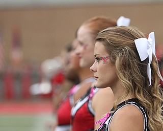 Nikos Frazier | The Vindicator..A Youngstown State University majorette waits on the sidelines before the YSU Marching Band took the field Stambaugh Stadium before YSU took on University of South Dakota on Saturday, Oct. 1, 2016.