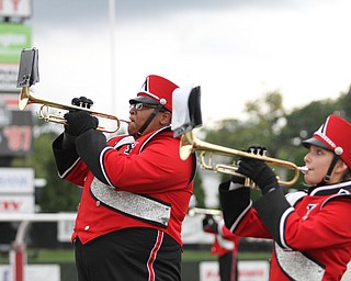 Nikos Frazier | The Vindicator..Two members of the Youngstown State University Marching Band perform at Stambaugh Stadium before YSU took on University of South Dakota on Saturday, Oct. 1, 2016.