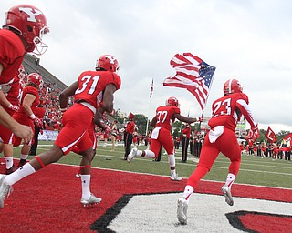 Nikos Frazier | The Vindicator..The Youngstown State Penguins take the field at Stambaugh Stadium in Youngstown on Saturday, Oct. 1, 2016.