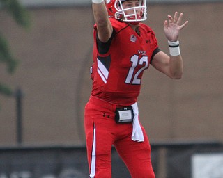 Nikos Frazier | The Vindicator..YSU's Ricky Davis(12) throws a pass in the first quarter at Stambaugh Stadium in Youngstown on Saturday, Oct. 1, 2016. Youngstown State University would go on to win, 30-20 against University of South Dakota.