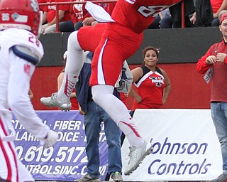 Nikos Frazier | The Vindicator..YSU's Kevin Rader(83) goes up for the catch near the endzone in the first quarter at Stambaugh Stadium in Youngstown on Saturday, Oct. 1, 2016. Youngstown State University would go on to win, 30-20 against University of South Dakota.