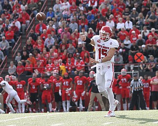Nikos Frazier | The Vindicator..USD's Chris Streveler(15) passes the ball in the second quarter at Stambaugh Stadium in Youngstown on Saturday, Oct. 1, 2016. Youngstown State University would go on to win, 30-20 against University of South Dakota.