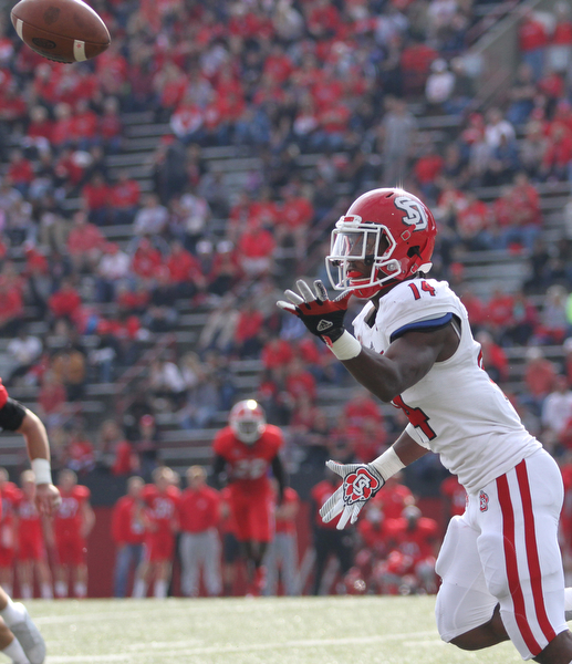 Nikos Frazier | The Vindicator..USD's Michael Fredrick(14) watches a wide pass in the second quarter at Stambaugh Stadium in Youngstown on Saturday, Oct. 1, 2016. Youngstown State University would go on to win, 30-20 against University of South Dakota.