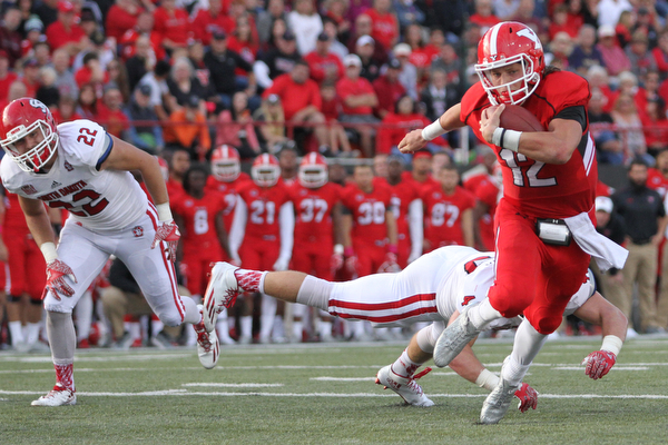 Nikos Frazier | The Vindicator..YSU's Ricky Davis(12) runs the football in the second quarter at Stambaugh Stadium in Youngstown on Saturday, Oct. 1, 2016. Youngstown State University would go on to win, 30-20 against University of South Dakota.