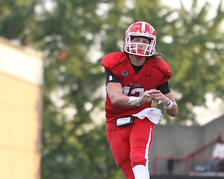 Nikos Frazier | The Vindicator..YSU's Ricky Davis(12) passes the football in the fourth quarter at Stambaugh Stadium in Youngstown on Saturday, Oct. 1, 2016. Youngstown State University would go on to win, 30-20 against University of South Dakota.