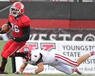 YOUNGSTOWN, OHIO - OCTOBER 1, 2016: Defensive back Jameel Smith #26 of YSU runs with he football after intercepting a pass intended for Riley Donovan #4 of South Dakota, he would fumble on the play and South Dakota would recover, during the second half of their game Saturday afternoon at Stambaugh Stadium. YSU won 30-20. DAVID DERMER | THE VINDICATOR