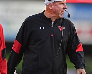 YOUNGSTOWN, OHIO - OCTOBER 1, 2016: Head coach Bo Pelini of YSU shouts at the officials after a non call during the second half of their game Saturday afternoon at Stambaugh Stadium. YSU won 30-20. DAVID DERMER | THE VINDICATOR