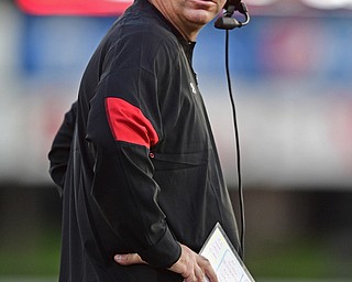 YOUNGSTOWN, OHIO - OCTOBER 1, 2016: Head coach Bo Pelini of YSU stares directly into the camera lens after arguing with the referee during the second half of their game Saturday afternoon at Stambaugh Stadium. YSU won 30-20. DAVID DERMER | THE VINDICATOR