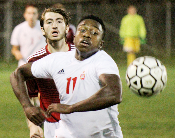 William D. Lewis The Vindicator Mooney's Justin Parkins(11) and ), left, and Fitch's Derian Mesaros(7) go for the ball during 1rst period action Oct. 4, 2016 at Simon Soccer Park in Struthers.