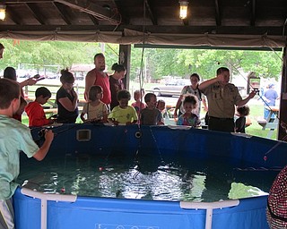 Neighbors | Alexis Bartolomucci.A pool filled with fish was available for the children and their families who wanted to practice fishing during the Family Fun Day at Boardman Park on Sept. 17.