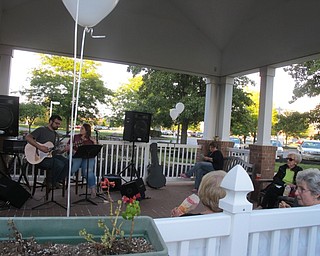 Neighbors | Alexis Bartolomucci.Musical duo, Party of Two, performed under the gazebo for the benefit concert at the Commons at Greenbriar on Sept. 15.