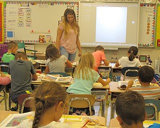 Neighbors | Alexis Bartolomucci.MacKenzie Kempers, a students at Poland Seminary High School, came to Poland Union on Sept. 20 to work with students in Karen Vasko's class for the Big Dog, Little Dog program.