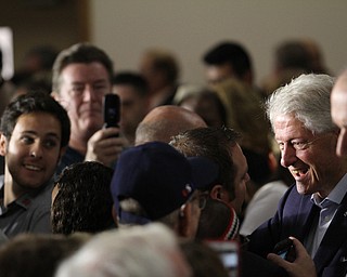Nikos Frazier | The Vindicator..Former President Bill Clinton greets supporters after speaking at the Western Reseve Building Trade Hall on McClurg Road in Youngstown.