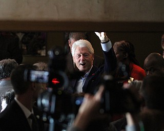 Nikos Frazier | The Vindicator..Former President Bill Clinton greets supporters at Vernon's Cafe in Niles during a stop on a bus tour of the Mahoning Valley.