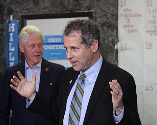Nikos Frazier | The Vindicator..Sen. Sherrod Brown(D-Ohio) introduces Former President Bill Clinton at the Trumbull County Hillary for America offices in Warren .