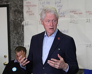 Nikos Frazier | The Vindicator..Former President Bill Clinton speaks to supporters and volunteers at the Trumbull County Hillary for America offices in Warren .