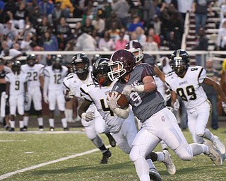 .William D. Lewis The Vindicator Boardman's Gaven Strines(9) is chased by Harding's Eli Watson(43) and Phazion Putnam(99) during Ot. 7, 2016 action in Boardman.