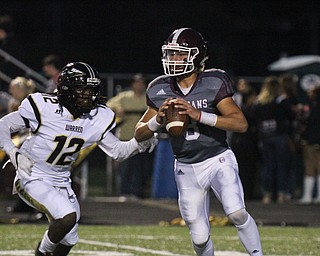 William D. Lewis The Vindicator Mike O'Horo(8) is chased by Harding's Jauton Lee(12) during Oct. 7, 2016 action in Boardman.