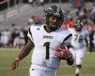 William D. Lewis The Vindicator Harding's Lynn Bowden scampers for 1rst qtr TD during Oct. 7, 2016 action in Boardman.