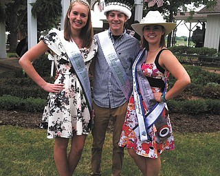 SPECIAL TO THE VINDICATOR
Karl Reph, center, president of Western Reserve 4-H Club, was crowned 4-H King at Youth Day ceremonies at the Canfield Fair. Tiffany Voland, left, also a member of the club, was chosen as first runner-up for 4-H Queen, and Erin Styka, another member, was selected as the 2016 Mahoning County Junior Fair Outstanding Youth. Karl and Erin are members of Mahoning County Junior Fair Board. Erin also is a member of Youngstown Tailwaggers 4-H Club and Tiffany also is a member of The Bunny Bunch 4-H Club.