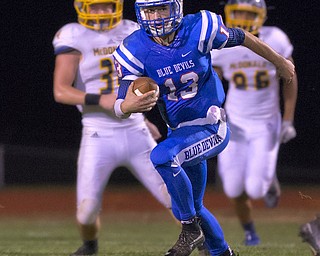 MICHAEL G TAYLOR | THE VINDICATOR- 10-07-16- 1st qtr, Reserve's #13 Wyatt Larimer cuts back for a big gain. McDonald Blue Devils vs Western Reserve Blue Devils at Western Reserve Stadium in Berlin Center, OH.
