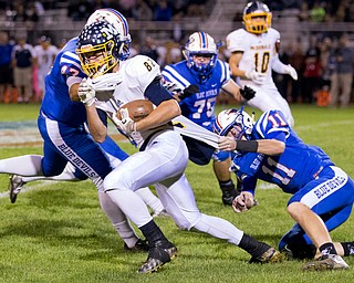 MICHAEL G TAYLOR | THE VINDICATOR- 10-07-16- 2nd qtr, Reserve's #47 Austin Jenkins and #11 Caleb Quinn bring down  McDonald's #82 Joe Sudol after a short return. McDonald Blue Devils vs Western Reserve Blue Devils at Western Reserve Stadium in Berlin Center, OH.