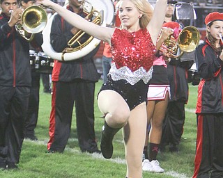 Campbell Memorial twirler Tia Yasechka performs during a pregame show before kickoff of Friday nigths matchup against Struthers at Campbell Memorial High School.  Dustin Livesay  |  The Vindicator  10/7/16  Campbell