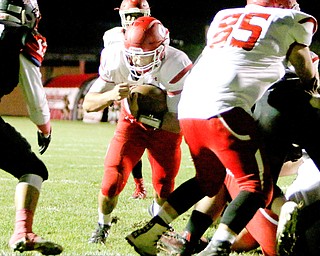 AJ Musolino (18) of Struthers follows a blocker during a QB sneak to score a touchdown during the second quarter of Friday nights matchup at Campbell Memorial High School.  Dustin Livesay  |  The Vindicator  10/7/16  Campbell.