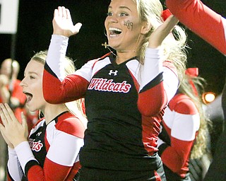Struthers High School junior cheerleader Abby Bayus celebrates after the Wildcats scored a touchdown during the second quarter of Friday nights matchup at Campbell Memorial High School.  Dustin Livesay  |  The Vindicator  10/7/16  Campbell.