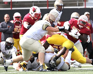 Nikos Frazier | The Vindicator..Mooney's Jaylen Hewlett(9) is taken down by the Canisius Defense in the first half as Cardinal Mooney took on Canisius High School(Buffalo) at Stambaugh Stadium in Youngstown, Ohio on Sat, Oct. 8, 2016.