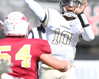 Nikos Frazier | The Vindicator..Canisius Quarterback Jayce Johnson(10) throws in the first half as Cardinal Mooney took on Canisius High School(Buffalo) at Stambaugh Stadium in Youngstown, Ohio on Sat, Oct. 8, 2016.