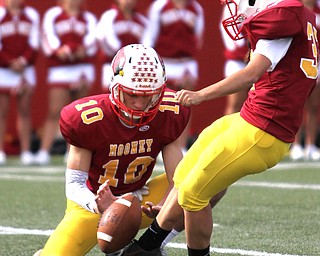 Nikos Frazier | The Vindicator..Mooney's Lizzie Philibin(37) kicks in the extra point in the second half as Cardinal Mooney took on Canisius High School(Buffalo) at Stambaugh Stadium in Youngstown, Ohio on Sat, Oct. 8, 2016.