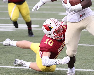 Nikos Frazier | The Vindicator..Mooney's Pat Pelini(10) atempts to bring down Canisius' RaeQwon Greer(11) in the second half as Cardinal Mooney took on Canisius High School(Buffalo) at Stambaugh Stadium in Youngstown, Ohio on Sat, Oct. 8, 2016.