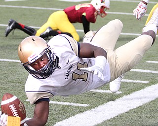 Nikos Frazier | The Vindicator..Canisius' RaeQwon Greer(11) unsuccessfully attempts to get the touchdown as he dives out-of-bounds in the second halfas Cardinal Mooney took on Canisius High School(Buffalo) at Stambaugh Stadium in Youngstown, Ohio on Sat, Oct. 8, 2016.