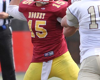 Nikos Frazier | The Vindicator..Mooney Quarterback Antonio Page(15) winds up for a pass in the second half as Cardinal Mooney took on Canisius High School(Buffalo) at Stambaugh Stadium in Youngstown, Ohio on Sat, Oct. 8, 2016.