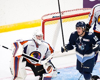 Youngstown Phantoms goalie Darion Hanson (30) looks on as Madison Capitols forward Mick Messner (10) celebrates his goal during the second period at the Covelli Centre on October 8, 2016.  Scott R. Galvin | Vindicator