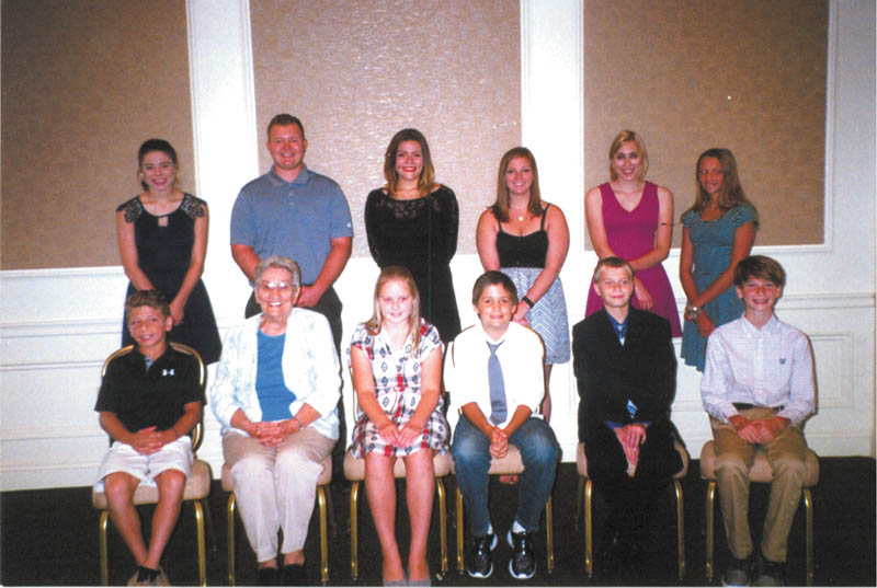 SPECIAL TO THE VINDICATOR
The Youngstown District of the First Catholic Slovak Ladies Association recently honored scholarship winners at a dinner at the Avalon Inn, Warren. President Bernadette Demechko announced that a total of $26,500 was awarded among 24 local recipients. Those attending the dinner, in front from left, were Christopher Leombruno, Demechko, Brooke Merrell, Aaron Slifka, Jeffrey Pezzuto and Nicholas Shannon, and in back were Emily Wolfgang; Joseph Shushok; Gabrielle Fellows; Kelly Passmore, winner of the Anna S. Granchay District Scholarship; Brooke Boovnyik; and Mya Agee.