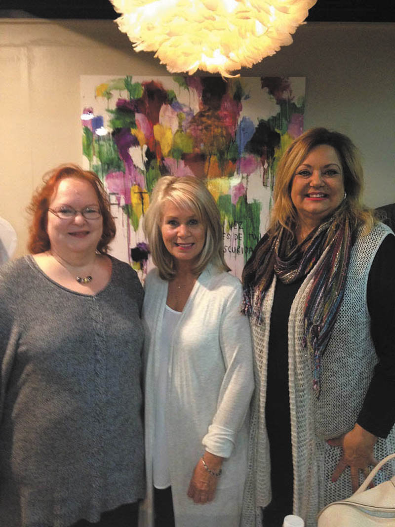 SPECIAL TO THE VINDICATOR
The Altrusa Club of Youngstown will host Shoppopalooza, an annual ladies luncheon and shopping event, Thursday at Michael Alberini’s Restaurant, 1140 Boardman-Poland Road, Poland. Doors open at 11 a.m. for networking and shopping with lunch served at noon. The event also will feature a gift auction and cash bar. The cost to attend in $20 per person. Suzi Schultz, center, a vendor from BeJeweled, prepares for Shoppopalooza with Kathleen Austrino, left, and Liz McGarry, Altrusa co-chairmen of the event. Altrusa is an international association of professional women dedicated to volunteer community service with an emphasis on literacy. For information on the event or Altrusa membership, call Austrino at 330-565-65190 or McGarry at 330-565-0228.