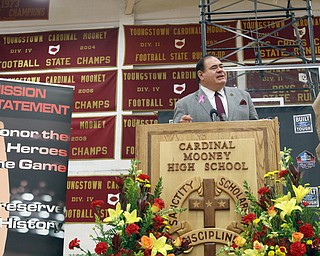        ROBERT K. YOSAY  | THE VINDICATOR.. Dave Baker President of HOF  talks about the elite club of football associated people... at the HOF  at the Eddie DeBartolo HOF plaque unveiling at Cardinal Mooney High School....... - -30-