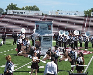 Neighbors | Alexis Bartolomucci.The Boardman High School marching band had a Spartan Saloon set up and rode fake horses during one of their performances on Sept. 13 for the Boardman elementary school students.