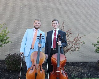 Neighbors | Submitted.Pictured are Simon Pusateri and Wyatt Miller with their cellos.