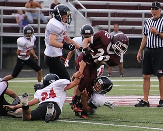 Neighbors | Submitted.CVMS seventh-graders Ryan Hively and Anthony Canacci tackle a Spartan ballcarrier.
