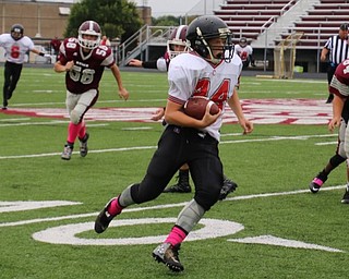 Neighbors | Submitted.CVMS eighth-grader Chris Sammarone looks for running room against Boardman Glenwood.