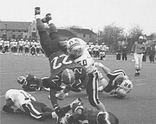 YSU VS VILLANOVA- FIRST DOWN-LEO HAWKINGS IS UPENDED ON HIS WAY TO A FIRST DOWN AND GOAL. HE WAS VERY CLOSE TO A TD AND SCORED SOON AFTER THIS PLAY. 11/30/91