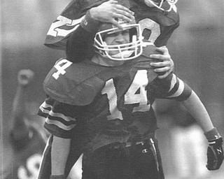 YSU VS VILLANOVA- CELEBRATION HOLDER LARRY BUCCIARELLI JUMPS ON KICKER JEFFERY WILINS' BACK AFTER WILKENS MADE THE WINNING KICK. 11/30/91