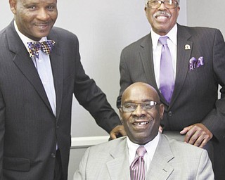 WILLIAM D. LEWIS | THE VINDICATOR
The 16th James Lottier Achievement Week banquet will take place Nov. 4 at Mahoning Country Club. Among the Omega Psi Phi Fraternity Inc. committee members preparing for the event are, seated, Kenneth Moore, program chairman, and, standing, Jerry Fordham, left, and Dan Smith, co-chairman.