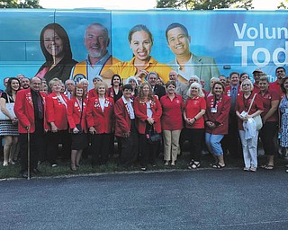 SPECIAL TO THE VINDICATOR
The Lions Clubs International Centennial bus visited Boardman on Sept. 21 as part of its tour of Lions clubs in select communities. LCI President Chancellor Bob Corlew met with volunteers to discuss critical service needs for the future of the organization as it marks 100 years of service. The bus will continue to tour through 20 Midwest and Eastern states including Washington, D.C., and also will make a stop in Ontario, Canada. The centennial celebration began last June in Fukuoka, Japan, and will end next summer in Chicago at the international convention. Up to 50,000 Lions are expected to attend the convention where a new area of focus will be revealed. For information on local Lions, visit www.lions13oh4.org.